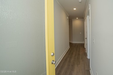 Location is everything, right? This brand new home is less than on Brick Landing Plantation Yacht and Golf Club in North Carolina - for sale on GolfHomes.com, golf home, golf lot