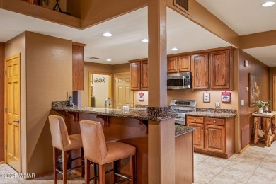 Immaculate condo, uniquely designed as a single-family residence on Pinetop Lakes Golf and Country Club in Arizona - for sale on GolfHomes.com, golf home, golf lot