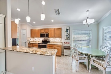 You will not be disappointed in this beautiful TURNKEY twin on Colonial Country Club in Florida - for sale on GolfHomes.com, golf home, golf lot