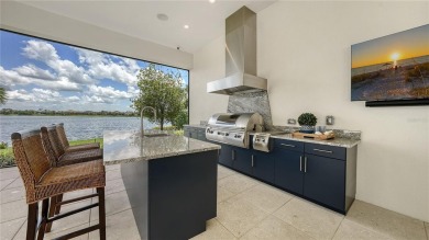 An exceptional expression of Florida luxury, this custom-built on Legacy Golf Club in Florida - for sale on GolfHomes.com, golf home, golf lot