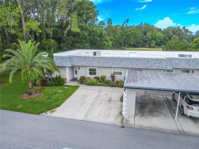 Under contract-accepting backup offers. This 2-bedroom, 2-bath on Seven Springs Golf and Country Club in Florida - for sale on GolfHomes.com, golf home, golf lot