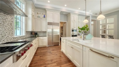 An exceptional expression of Florida luxury, this custom-built on Legacy Golf Club in Florida - for sale on GolfHomes.com, golf home, golf lot