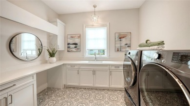 An exceptional expression of Florida luxury, this custom-built on Legacy Golf Club in Florida - for sale on GolfHomes.com, golf home, golf lot