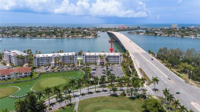This exquisite penthouse offers stunning views of the on Isla Del Sol Yacht and Country Club in Florida - for sale on GolfHomes.com, golf home, golf lot