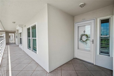This exquisite penthouse offers stunning views of the on Isla Del Sol Yacht and Country Club in Florida - for sale on GolfHomes.com, golf home, golf lot