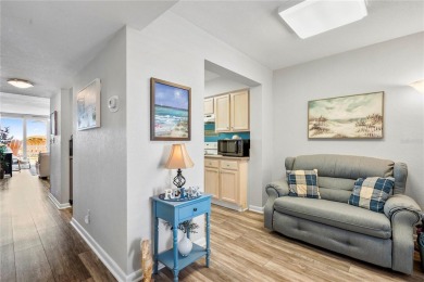 This exquisite penthouse offers stunning views of the on Isla Del Sol Yacht and Country Club in Florida - for sale on GolfHomes.com, golf home, golf lot