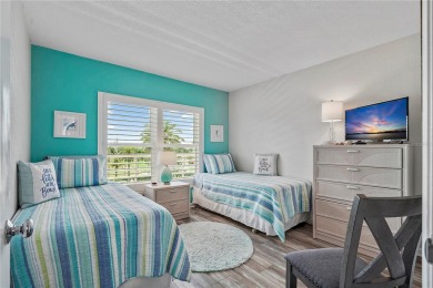 This exquisite penthouse offers stunning views of the on Isla Del Sol Yacht and Country Club in Florida - for sale on GolfHomes.com, golf home, golf lot