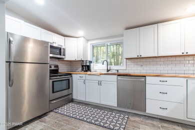 Welcome to this beautifully updated single-floor ranch home on Lords Valley Country Club, Inc in Pennsylvania - for sale on GolfHomes.com, golf home, golf lot