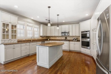 This standout property in the heart of Marlboro, NJ calls to the on Bella Vista Country Club in New Jersey - for sale on GolfHomes.com, golf home, golf lot