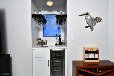 RARE FIRST FLOOR END VERANDA CONDO with den and garage located on Kelly Greens Golf and Country Club in Florida - for sale on GolfHomes.com, golf home, golf lot