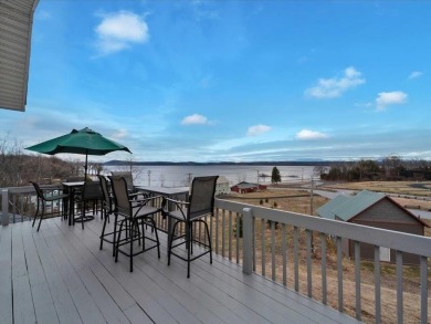 Experience the best of lakefront living in this beautifully on Apple Island Golf Course At Apple Island Resort in Vermont - for sale on GolfHomes.com, golf home, golf lot