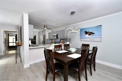 RARE FIRST FLOOR END VERANDA CONDO with den and garage located on Kelly Greens Golf and Country Club in Florida - for sale on GolfHomes.com, golf home, golf lot