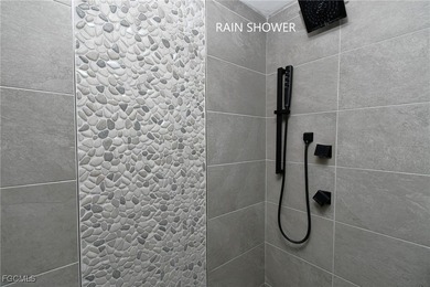 RARE FIRST FLOOR END VERANDA CONDO with den and garage located on Kelly Greens Golf and Country Club in Florida - for sale on GolfHomes.com, golf home, golf lot