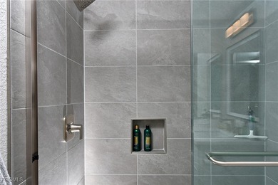 RARE FIRST FLOOR END VERANDA CONDO with den and garage located on Kelly Greens Golf and Country Club in Florida - for sale on GolfHomes.com, golf home, golf lot