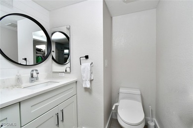 RARE FIRST FLOOR END VERANDA CONDO with den and garage located on Kelly Greens Golf and Country Club in Florida - for sale on GolfHomes.com, golf home, golf lot