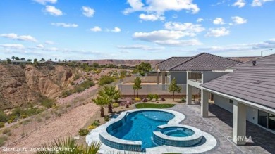 Positioned atop a scenic ridge, this impeccable home provides on Falcon Ridge Golf Course in Nevada - for sale on GolfHomes.com, golf home, golf lot