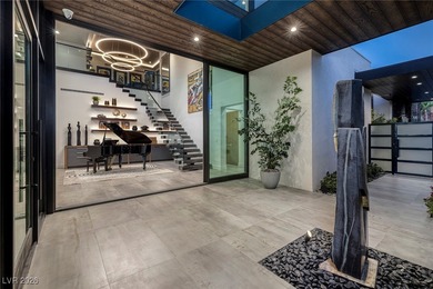 Discover this extraordinary home by award-winning Christopher on Dragon Ridge Country Club in Nevada - for sale on GolfHomes.com, golf home, golf lot