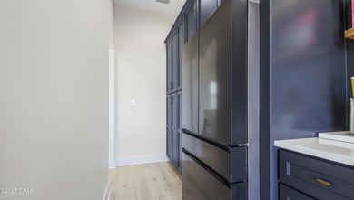 Experience waterfront living in Bay Point with front-row seats on Bay Point Resort Golf Club in Florida - for sale on GolfHomes.com, golf home, golf lot