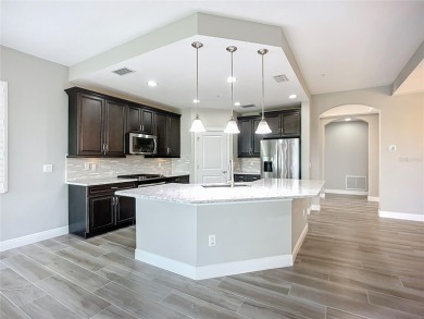 Come live a relaxing lifestyle in this Beautiful Coach Home in on Ritz-Carlton Members Golf Club in Florida - for sale on GolfHomes.com, golf home, golf lot