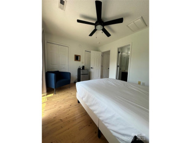 Discover this delightful fully furnished end-unit home on Lenoir Golf Club in North Carolina - for sale on GolfHomes.com, golf home, golf lot