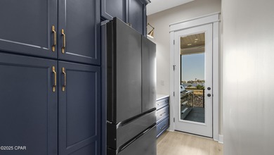 Experience waterfront living in Bay Point with front-row seats on Bay Point Resort Golf Club in Florida - for sale on GolfHomes.com, golf home, golf lot