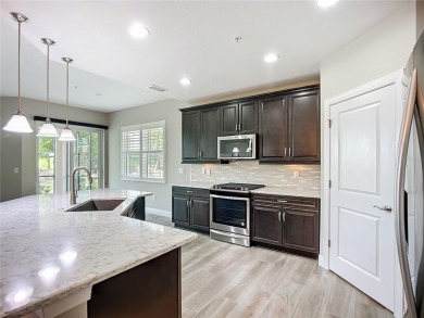 Come live a relaxing lifestyle in this Beautiful Coach Home in on Ritz-Carlton Members Golf Club in Florida - for sale on GolfHomes.com, golf home, golf lot