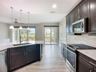 Come live a relaxing lifestyle in this Beautiful Coach Home in on Ritz-Carlton Members Golf Club in Florida - for sale on GolfHomes.com, golf home, golf lot