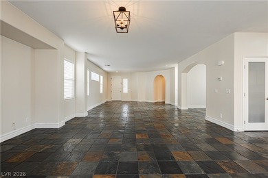 Welcome to an elevated living experience in the prestigious on Rhodes Ranch Golf Club in Nevada - for sale on GolfHomes.com, golf home, golf lot