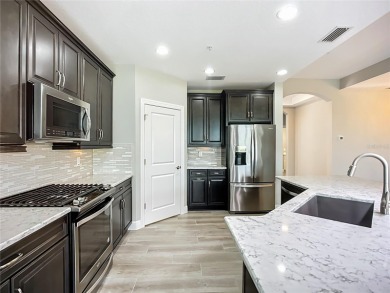 Come live a relaxing lifestyle in this Beautiful Coach Home in on Ritz-Carlton Members Golf Club in Florida - for sale on GolfHomes.com, golf home, golf lot