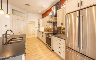 This is a MUST-SEE CUSTOM HILLSBORO floor plan home set up in on Heritage Highlands At Dove Mountain in Arizona - for sale on GolfHomes.com, golf home, golf lot