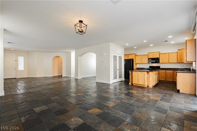 Welcome to an elevated living experience in the prestigious on Rhodes Ranch Golf Club in Nevada - for sale on GolfHomes.com, golf home, golf lot