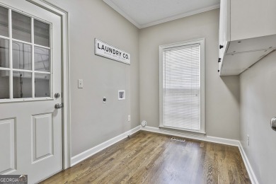 Enjoy the golf course views from this beautifully updated on Canongate On White Oak Golf Course in Georgia - for sale on GolfHomes.com, golf home, golf lot