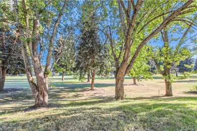 Welcome home to this charming townhome retreat nestled on a on Rock Creek Country Club in Oregon - for sale on GolfHomes.com, golf home, golf lot