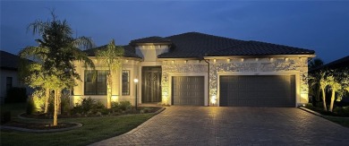 This exceptional Renown model was originally built for a fellow on The Concession Golf Club in Florida - for sale on GolfHomes.com, golf home, golf lot