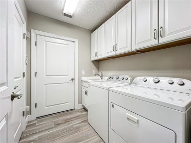 Come live a relaxing lifestyle in this Beautiful Coach Home in on Ritz-Carlton Members Golf Club in Florida - for sale on GolfHomes.com, golf home, golf lot
