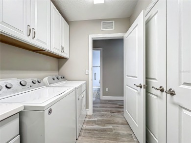 Come live a relaxing lifestyle in this Beautiful Coach Home in on Ritz-Carlton Members Golf Club in Florida - for sale on GolfHomes.com, golf home, golf lot