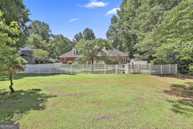 Enjoy the golf course views from this beautifully updated on Canongate On White Oak Golf Course in Georgia - for sale on GolfHomes.com, golf home, golf lot