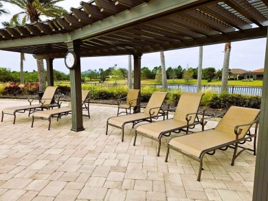 Come live a relaxing lifestyle in this Beautiful Coach Home in on Ritz-Carlton Members Golf Club in Florida - for sale on GolfHomes.com, golf home, golf lot
