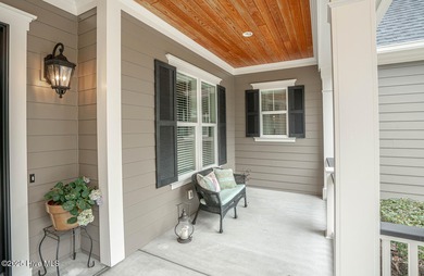 Hello Curb Appeal! A low country inspired 4BR and 3.5BA home on Ocean Ridge Plantation in North Carolina - for sale on GolfHomes.com, golf home, golf lot