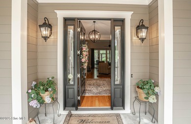 Hello Curb Appeal! A low country inspired 4BR and 3.5BA home on Ocean Ridge Plantation in North Carolina - for sale on GolfHomes.com, golf home, golf lot