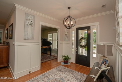 Hello Curb Appeal! A low country inspired 4BR and 3.5BA home on Ocean Ridge Plantation in North Carolina - for sale on GolfHomes.com, golf home, golf lot