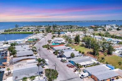 Under contract-accepting backup offers. LOWEST PRICED SFR on Key Royale Club in Florida - for sale on GolfHomes.com, golf home, golf lot