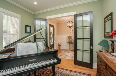 Hello Curb Appeal! A low country inspired 4BR and 3.5BA home on Ocean Ridge Plantation in North Carolina - for sale on GolfHomes.com, golf home, golf lot