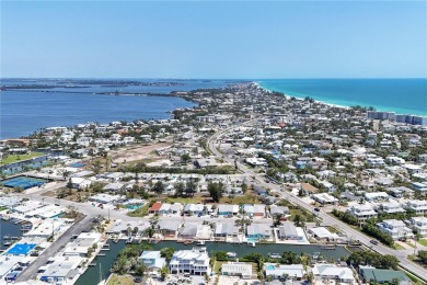 Under contract-accepting backup offers. LOWEST PRICED SFR on Key Royale Club in Florida - for sale on GolfHomes.com, golf home, golf lot