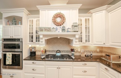 Hello Curb Appeal! A low country inspired 4BR and 3.5BA home on Ocean Ridge Plantation in North Carolina - for sale on GolfHomes.com, golf home, golf lot