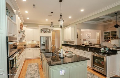 Hello Curb Appeal! A low country inspired 4BR and 3.5BA home on Ocean Ridge Plantation in North Carolina - for sale on GolfHomes.com, golf home, golf lot