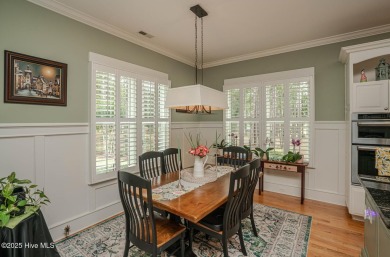 Hello Curb Appeal! A low country inspired 4BR and 3.5BA home on Ocean Ridge Plantation in North Carolina - for sale on GolfHomes.com, golf home, golf lot