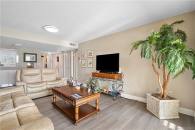 Fully renovated with quality finishes, this light and bright 1 on Miles Grant Country Club in Florida - for sale on GolfHomes.com, golf home, golf lot