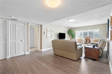 Fully renovated with quality finishes, this light and bright 1 on Miles Grant Country Club in Florida - for sale on GolfHomes.com, golf home, golf lot