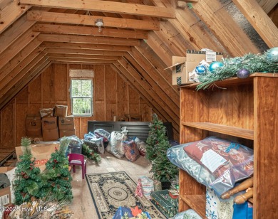 Hello Curb Appeal! A low country inspired 4BR and 3.5BA home on Ocean Ridge Plantation in North Carolina - for sale on GolfHomes.com, golf home, golf lot